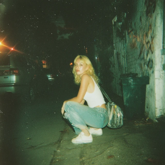 90s Blonde Woman In Alley Analog Photo