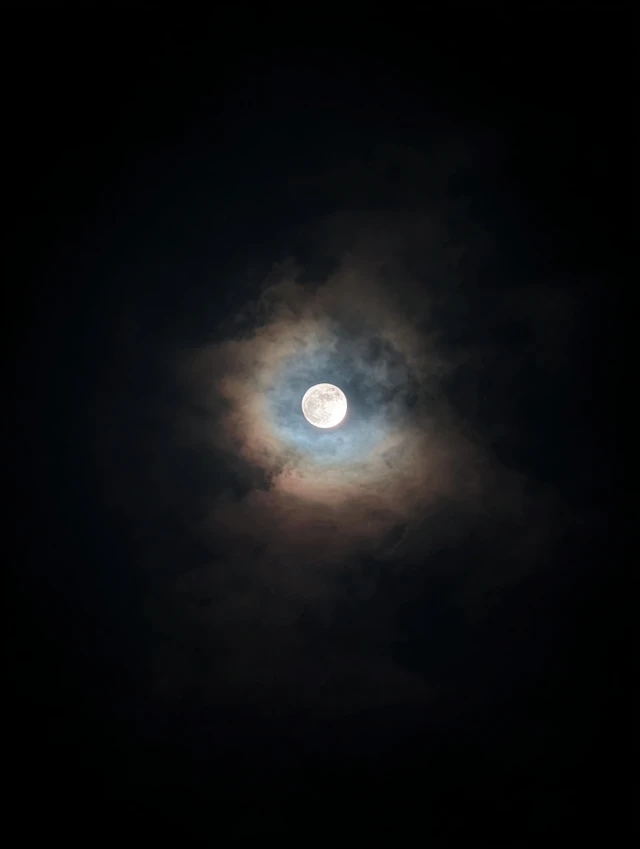 Eerie Moon in Black Sky Horror Scene