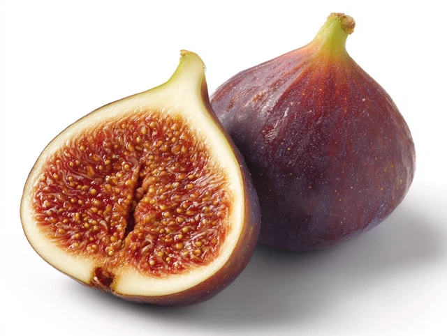 Fresh Fig Cut Open On White Background