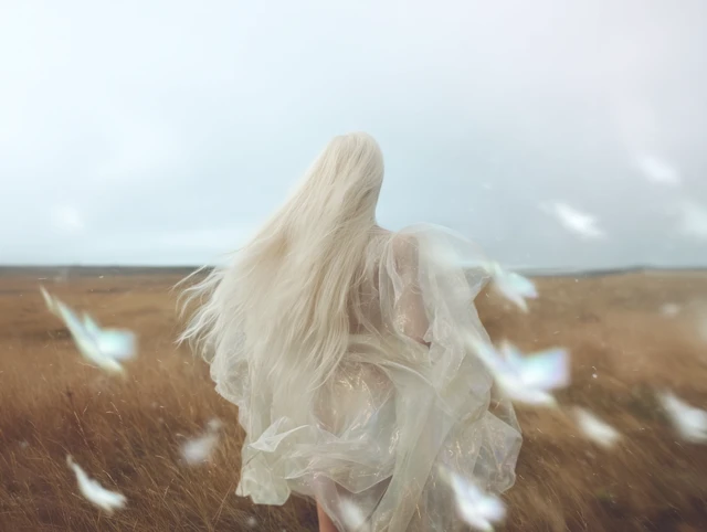 Surreal Blonde Woman Running Through Lilies Ethereal Scene