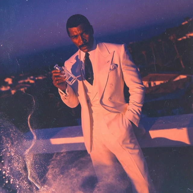 Suave Man in Summer Suit Perfume Ad