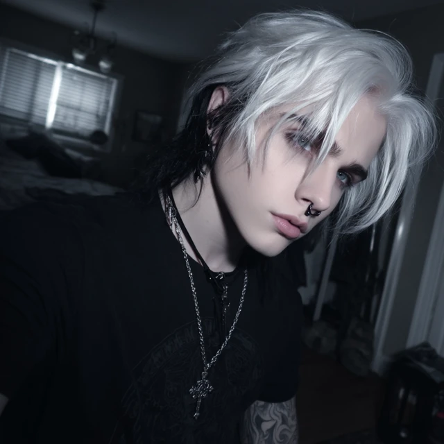 Gothic Man with White Hair and Piercings