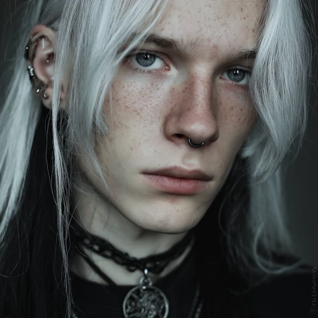 Gothic Man with White Hair and Piercings