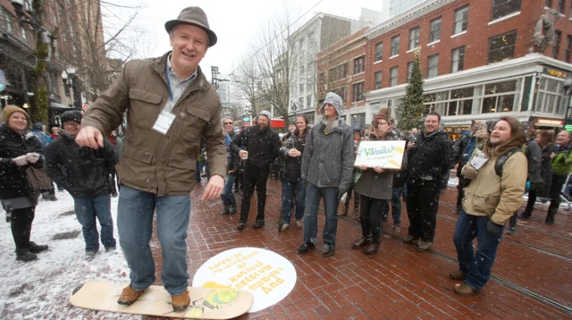 Man Surfing on Cardboard in Snow