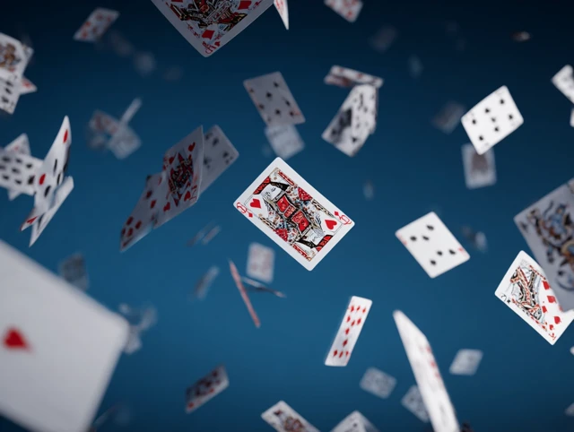 Flying Playing Cards Against Blue Background