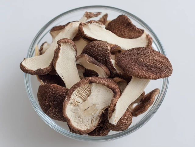 Shiitake Mushroom Slices in Glass Bowl High Resolution
