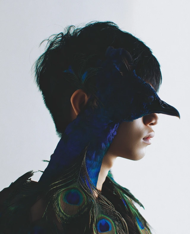 Indonesian Man Peacock Portrait Photography