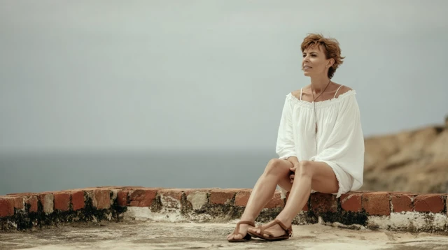 Woman in White by the Sea