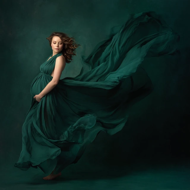 Maternity Portrait Green Dress and Flowing Fabric