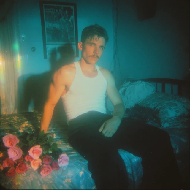 Man with Roses Blue Nighttime Photograph