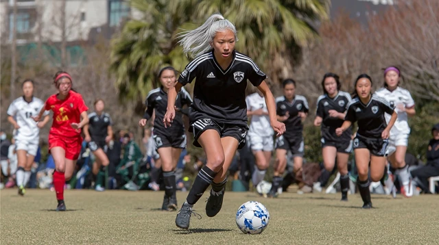 Asian Female Soccer Player with White Hair