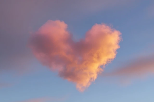 Heart Shaped Cloud in Sky Soft Lighting