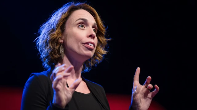 Confident Female Speaker On Stage