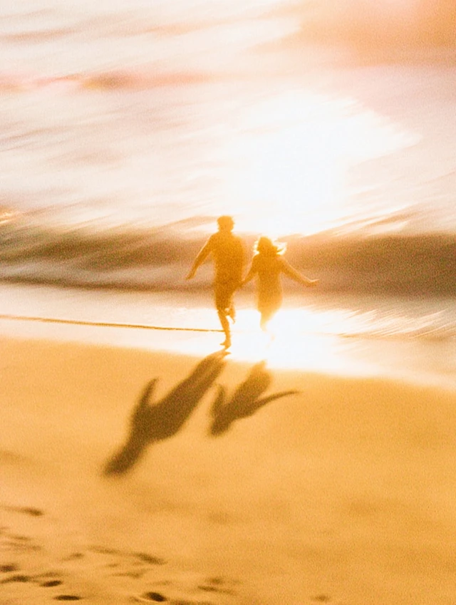 Couple Running on Beach Golden Hour Retro Photo