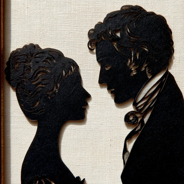 Vintage Silhouette: Couple Face to Face in 18th Century Style