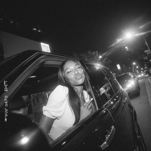 Nighttime Joy Black Woman in Range Rover iPhone Photo
