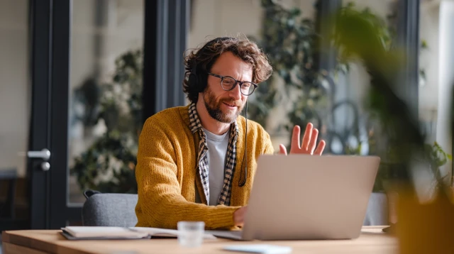 Man Attending Webinar Online on Laptop