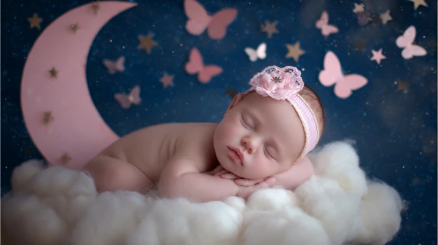 Sleeping Baby In Dreamland With Butterflies