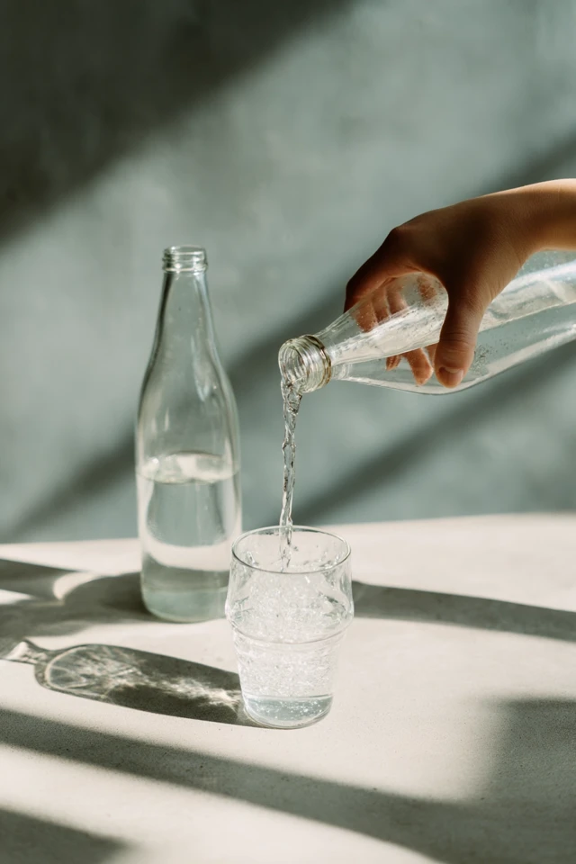 Pouring Water Glass Bottle Hand Refreshment
