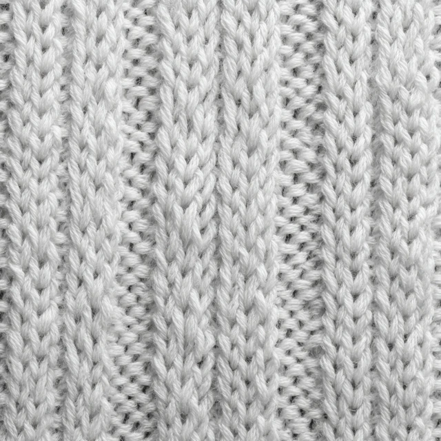 White Knitted Fabric Texture Closeup