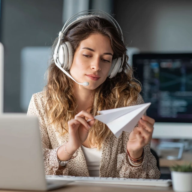Tech Support Girl with Paper Airplane