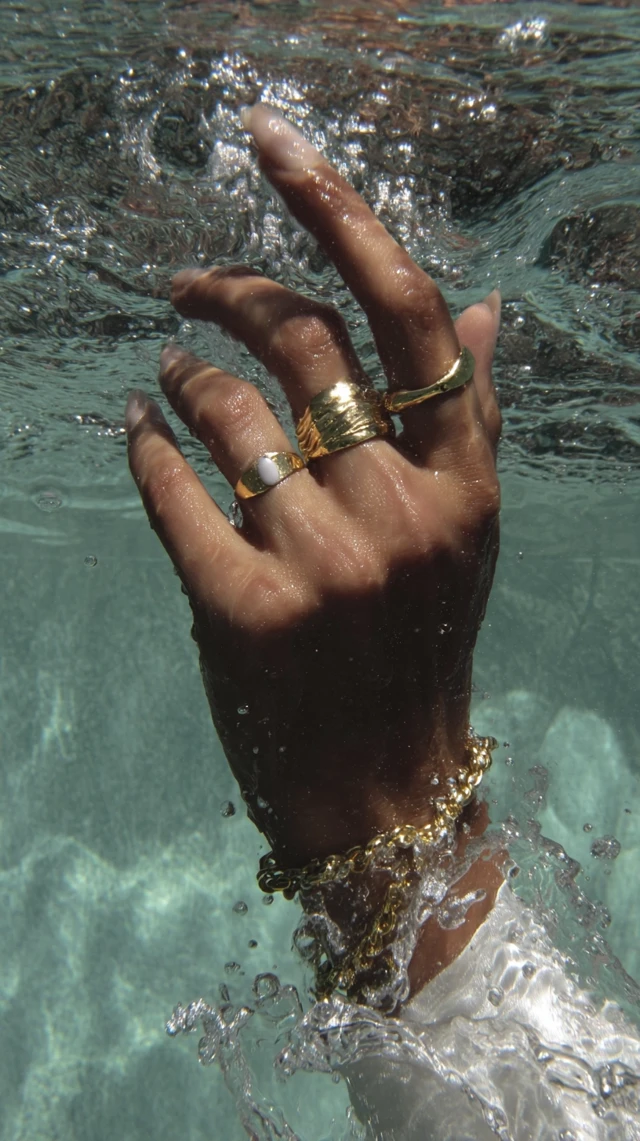 Gold Rings Under Water Luxury Editorial Shot