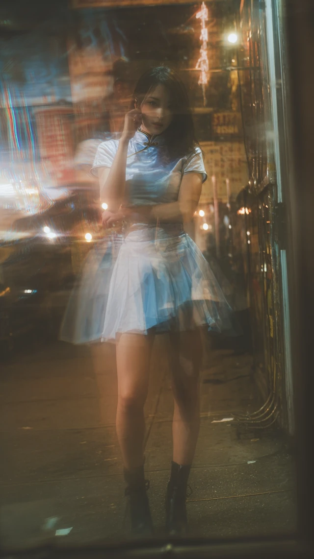 Asian Woman in Retro Chinese Costume Downtown