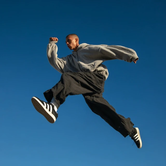 Streetwear Model Leaping in Air Fashion Photography
