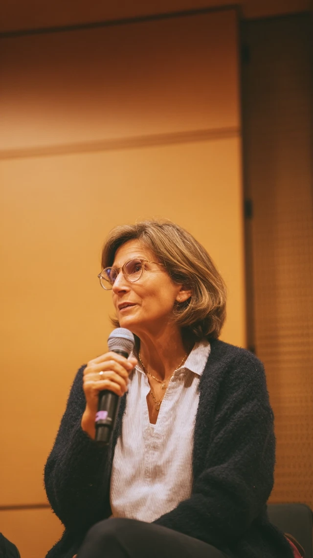 Woman on Stage Giving a Lecture Interview
