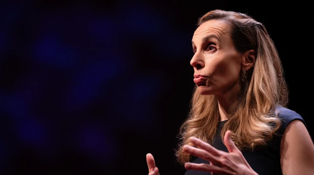 Confident Female Speaker On Stage
