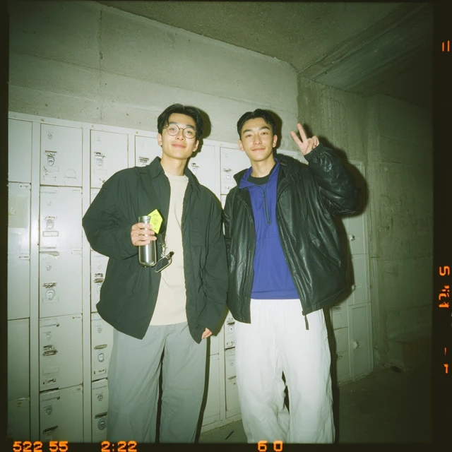 Japanese Men in Warehouse Locker Lobby - Fashion Portrait