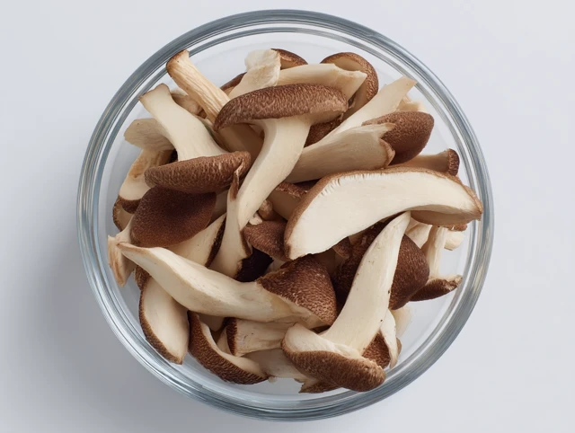Shiitake Mushroom Slices in Glass Bowl High Resolution