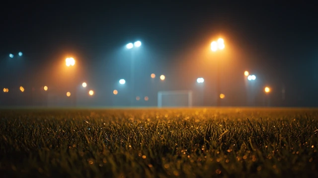 Football Field at Night Glowing Stadium Lights