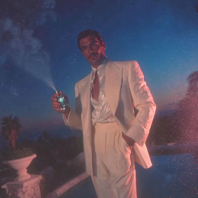 Suave Man in Summer Suit Perfume Ad