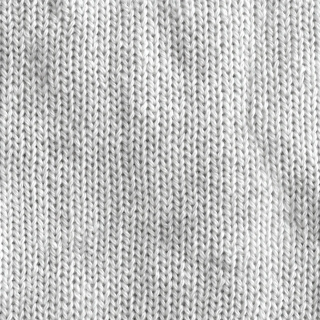 White Knitted Fabric Texture Closeup