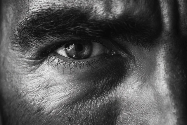 Intense Gaze Arab Man Close Up in Black and White