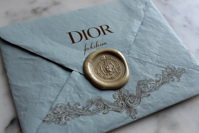 Dior Envelope Rococo Style Wax Seal on Marble