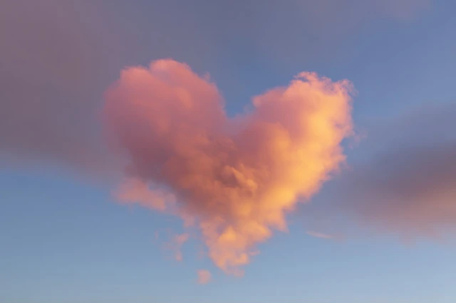 Heart Shaped Cloud in Sky Soft Lighting