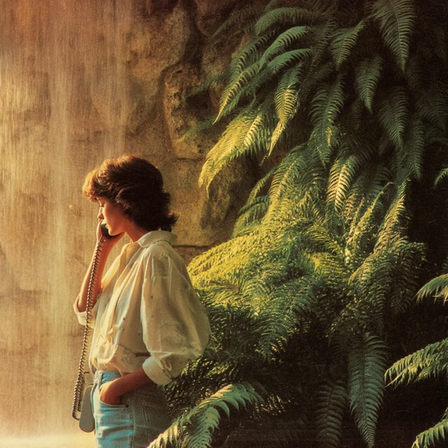 Woman on Phone 1980s Ferns Afternoon Sun