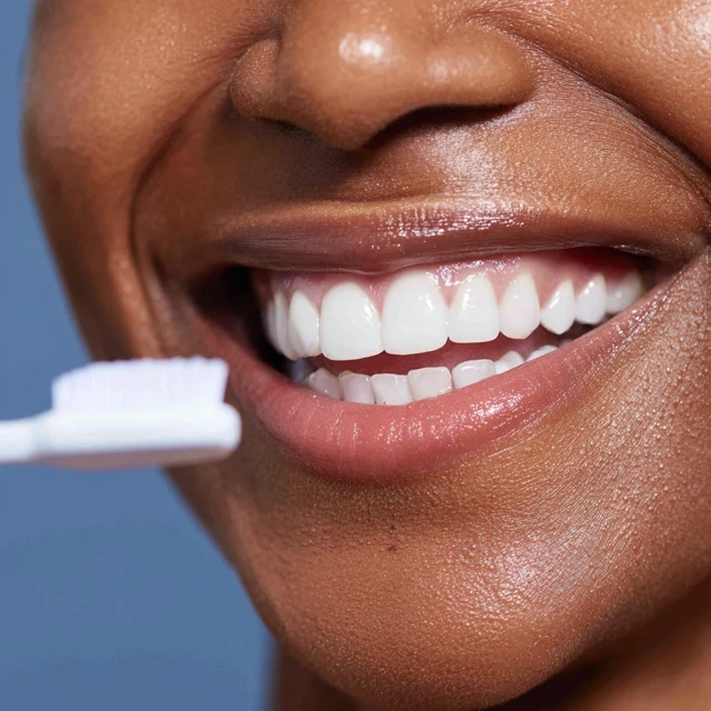 Smiling Woman Brushing Teeth Dental Care