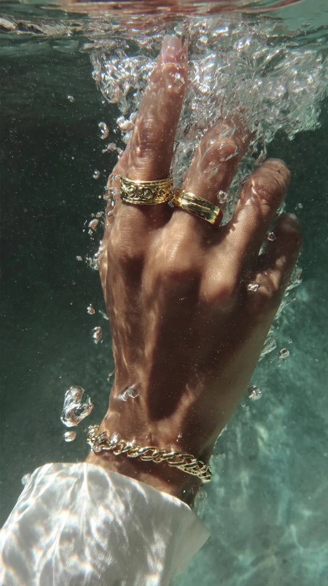 Gold Rings Under Water Luxury Editorial Shot