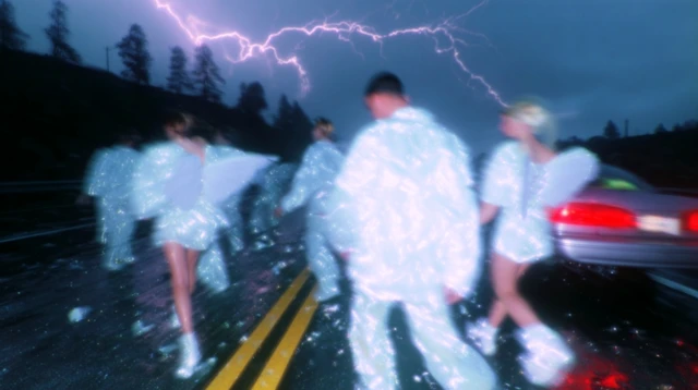 Angels Running on a Rainy Highway at Night