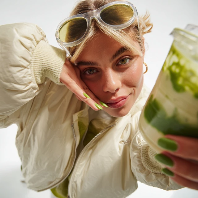 Blonde Woman with Matcha Green Nails Sunglasses and Matcha