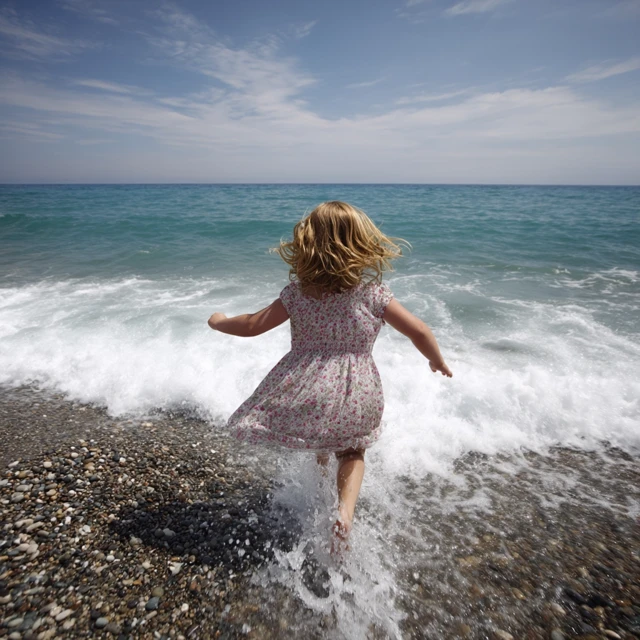 Girl Running on the Beach at Sunset