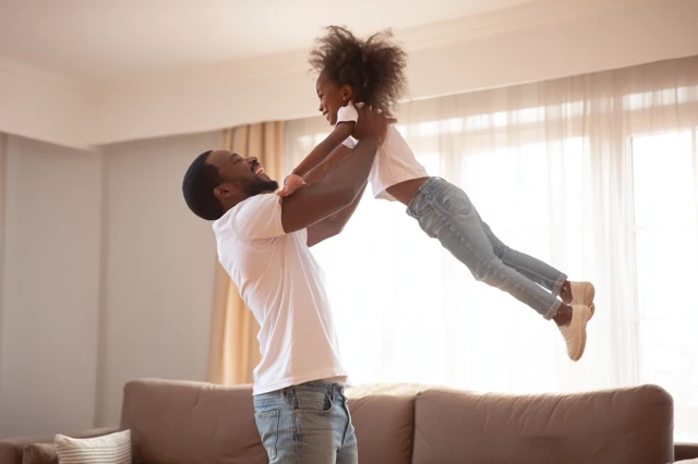 Latin Father and Daughter: Tender Moment at Home