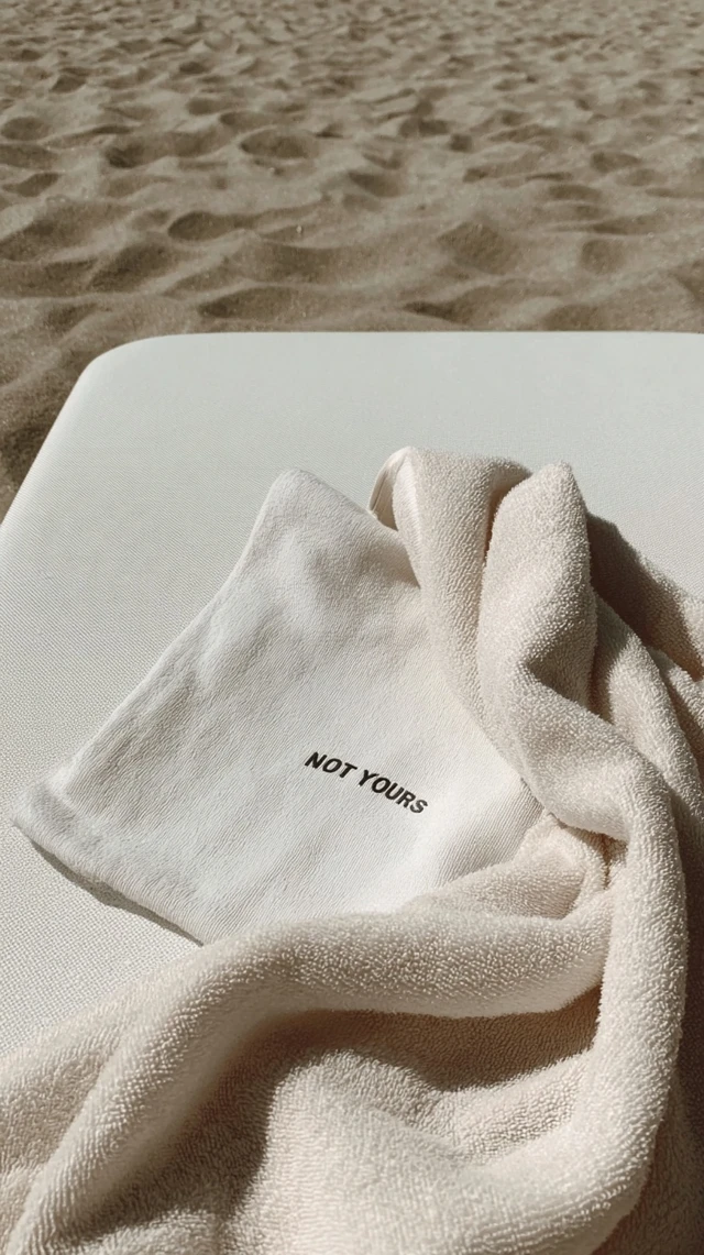 Luxury Towel on Beach Minimalist Photo