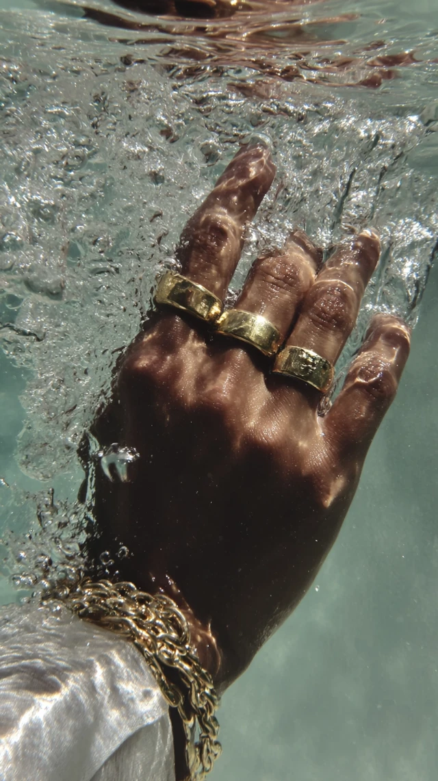 Gold Rings Under Water Luxury Editorial Shot