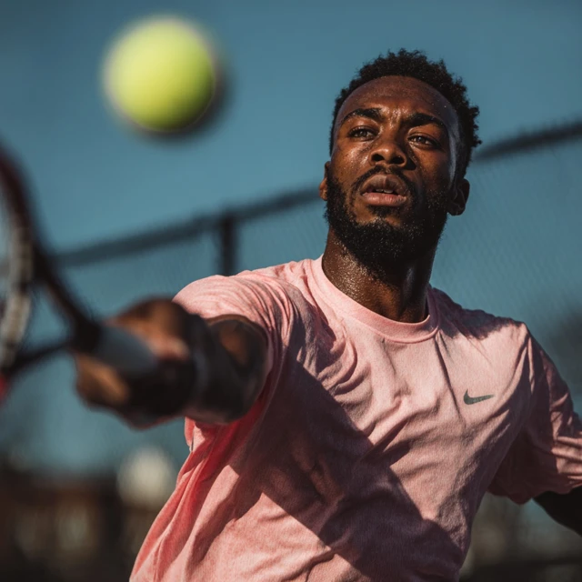 Tennis Player in Action High Definition Photo