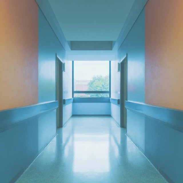 Modern Hospital Corridor in Orange and Blue
