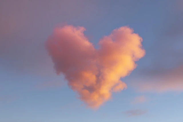 Heart Shaped Cloud in Sky Soft Lighting